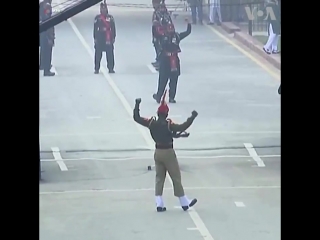 changing of the guards on the border between pakistan and india. this is awesome d