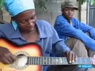 the black woman burns on the guitar