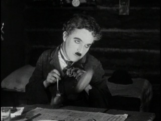 charlie chaplin - dance with buns (from the movie gold rush)
